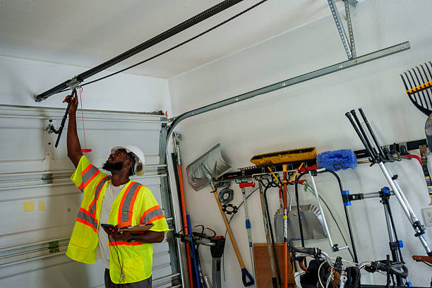 Professional Garage Door Panel Replacement technician working in Poquott, NY